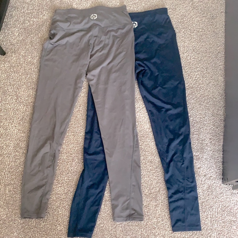 Two pairs of high waisted yoga pants with pocket